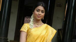 Shriya Saran looks radiant as she drapes six yards of bright yellow saree