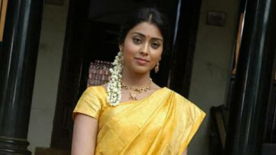 Shriya Saran looks radiant as she drapes six yards of bright yellow saree