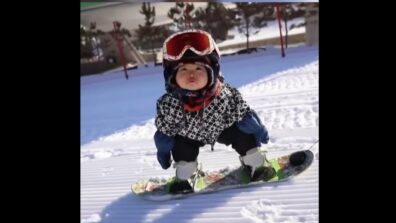 An 11-month-old baby has wowed netizens with her snowboarding skills