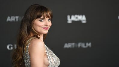 Dakota Johnson Is All Smiles In Latest Bejeweled Crop Top With Satin Pants