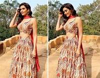 Karishma Tanna Looks Steaming Hot Wedding Guest Look In Golden Lehenga - 2