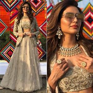 Karishma Tanna Looks Steaming Hot Wedding Guest Look In Golden Lehenga - 3