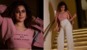 Queen Sanya Malhotra has no time for love as she poses in pink crop top and white flared pant