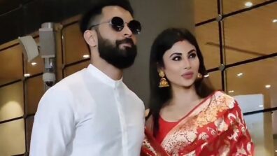 Watch: Mouni Roy and Suraj Nambiar return to Mumbai after marriage, spotted getting romantic at airport