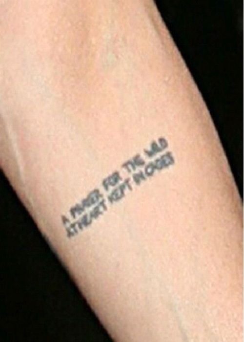 Angelina Jolie’s Tattoos & Its Meaning Revealed: Has A Bengal Tiger - 8