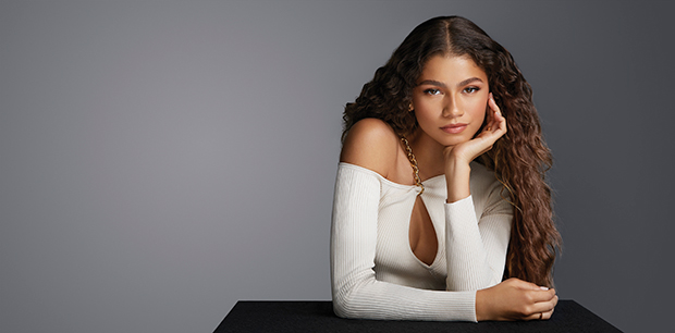 For A Lancome Ad, Zendaya Looks Flawlessly Beautiful With A Keyhole Sweater And Curly Hair - 1