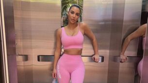 In A Pink Workout Crop Top And Leggings, Kim Kardashian Looks Like Barbie