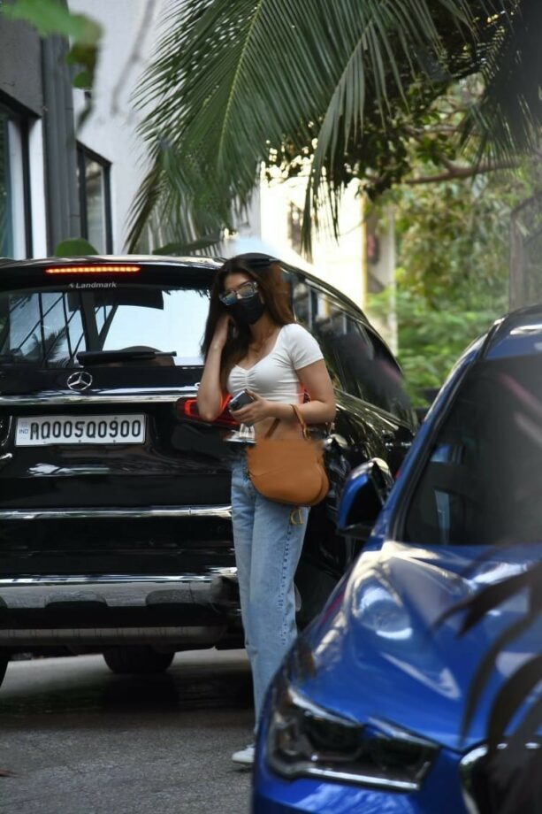 Kriti Sanon Splendid Casual Look In A White Crop Top And Denim Jeans With Small Handbag, See Pics - 0