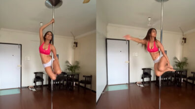 Nia Sharma does sensuous pole dance in orange bralette and shorts, checkout video