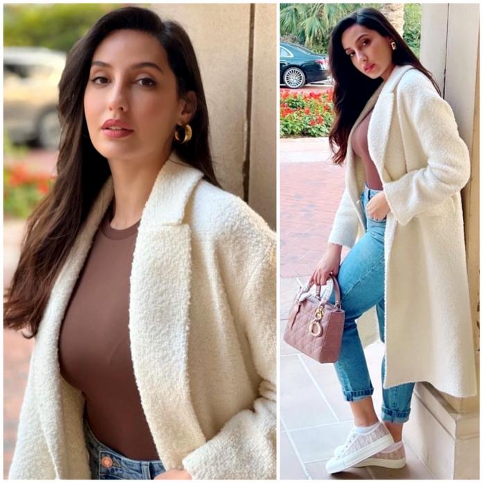 Nora Fatehi Looks Warm And Cosy In A Fleece Jacket Topped With An Adorable Dior Purse - 0