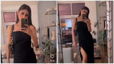 Gorgeous: Mouni Roy sends flattering waves in a deep plunging neck black midi dress