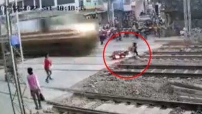 Watch A Motocross Rider Narrowly Avoid Getting Hit By A Rushing Train While Attempting To Cross Tracks, Tap Here