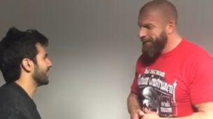 Huge Milestone: Varun Dhawan meets WWE legend Triple H, see viral video