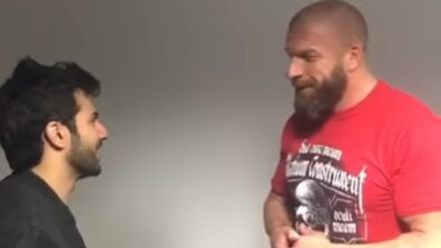 Huge Milestone: Varun Dhawan meets WWE legend Triple H, see viral video