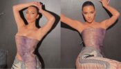 Kim Kardashian oozes in hotness with her sassy asymmetrical top and ripped jeans, see pictures