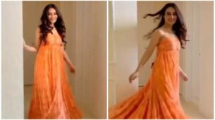 Summer Perfect: Surbhi Jyoti twirls in her maxi orange floral dress