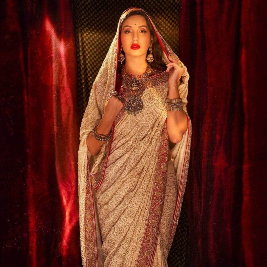 Nora Fatehi Looks Like A Royalty In These Designer Sarees, Check Out - 4