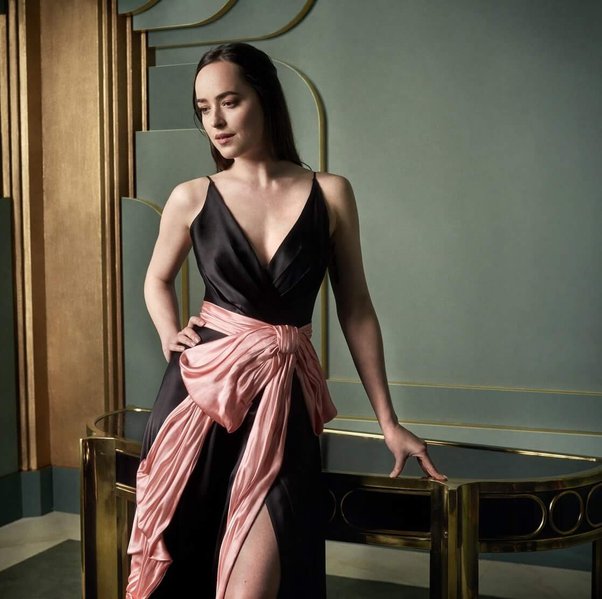 Dakota Johnson Makes A Bold Statement In Black Dresses - 0