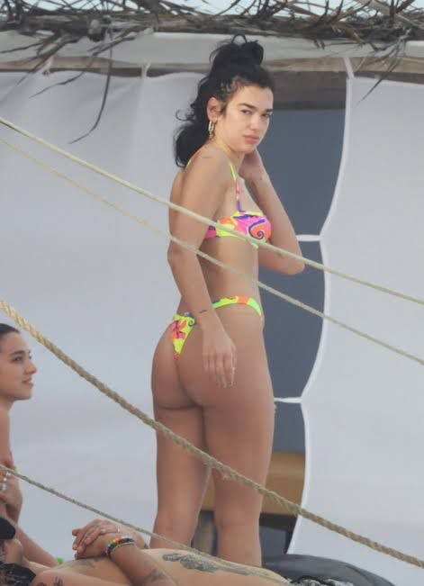 Dua Lipa Looks Extremely Pretty In Her Yellow Bikini! Take A Look - 2