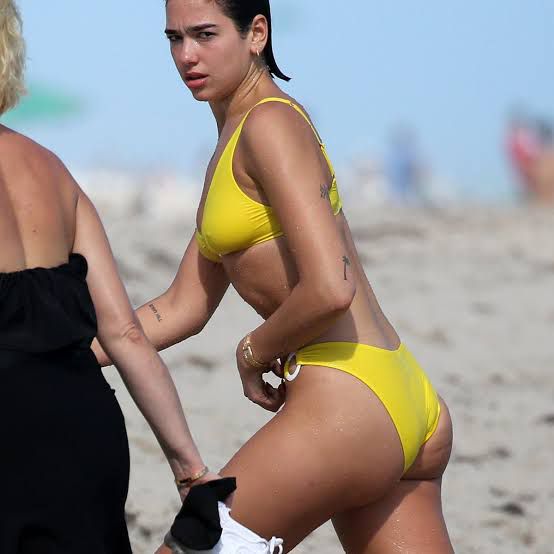 Dua Lipa Looks Extremely Pretty In Her Yellow Bikini! Take A Look - 0