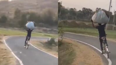 Anand Mahindra refers a man as a “human Segway” as he balances a sack on his head while cycling on narrow road