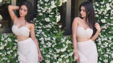 Mouni Roy dazzles in a white plunging neckline bralette, gets surrounded by beautiful white flowers