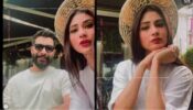 Mouni Roy is busy snacking on sun with hubby Suraj Nambiar, twin in grey tshirt