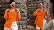 Avneet Kaur ups her glam quotient in orange oversized shirt and white biker shorts