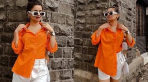 Avneet Kaur ups her glam quotient in orange oversized shirt and white biker shorts