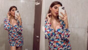 Stunning: Nikki Tamboli looks fierce in a deep neck floral mini outfit