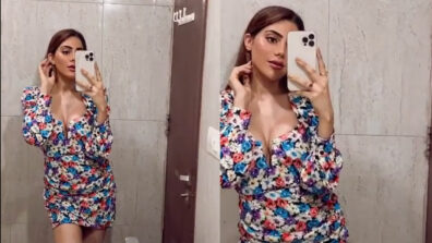 Stunning: Nikki Tamboli looks fierce in a deep neck floral mini outfit