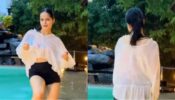 Tera Pyaar Mujhe Kheeche: TMKOC diva Palak Sindhwani goes wild in rain, flaunts curvaceous midriff in oversized top and black shorts