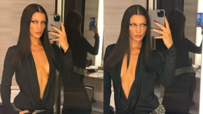 Bella Hadid Shows-Off Her Sultry Body In A Veru Low-cut Silk Shirt From The Backstage During Milan Fashion Week, Take A Look