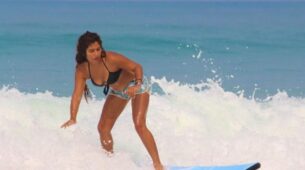By The Wave: TMKOC diva Nidhi Bhanushali loves water, shares sensuous surfing moment in black bra and hot pants