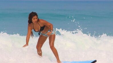 By The Wave: TMKOC diva Nidhi Bhanushali loves water, shares sensuous surfing moment in black bra and hot pants