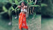 TMKOC babe Nidhi Bhanushali is all about ‘happy vibe’, sets internet on fire in white bralette and printed skirt
