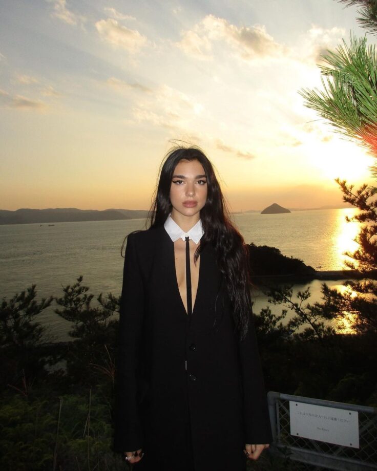 Photodump: Dua Lipa explores Naoshima, Japan in plunging shirt dress - 1