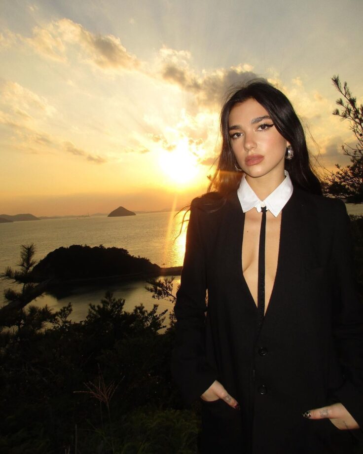 Photodump: Dua Lipa explores Naoshima, Japan in plunging shirt dress - 2