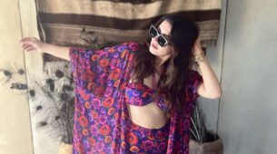 Hansika Motwani is making us drool in stunning purple floral maxi cape outfit, impresses with cool sunglasses