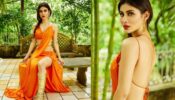 Mouni Roy Looks Piping Hot In Orange Backless Thigh-high Slit Cut-out Gown