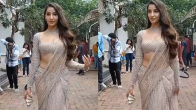 Nora Fatehi Looks Smoking Hot In Beige Embellished Saree