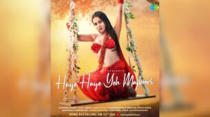Uff Haye Garmi: Urfi Javed takes internet by storm in red saree, flaunts curvaceous midriff while getting wet in rain