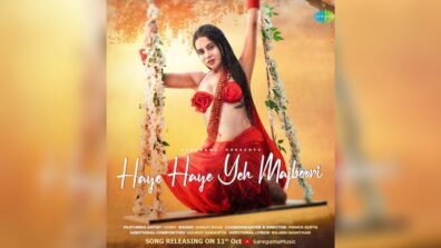 Uff Haye Garmi: Urfi Javed takes internet by storm in red saree, flaunts curvaceous midriff while getting wet in rain