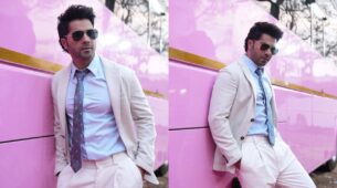 Check Out: Varun Dhawan Serves Some Dashing Looks In A White Blazer Suit, Says “I Like Pink”
