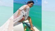 Body at home, mind is traveling: Nia Sharma is busy exploring oceans, looks stunning in bikini and transparent cape outfit
