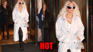 Kim Kardashian slays the oomph game in white trench coat, fans sweat