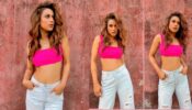 Nia Sharma flaunts curvaceous midriff in pink bralette and denims, we are sweating