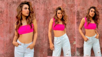 Nia Sharma flaunts curvaceous midriff in pink bralette and denims, we are sweating