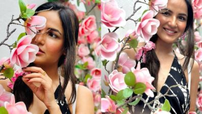 Jasmin Bhasin is a floral muse in a striped halter-neck black dress