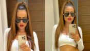 Know the boss! Nia Sharma is preppy hot in all white pantsuit, bold cherry red lips and celeb ponytail